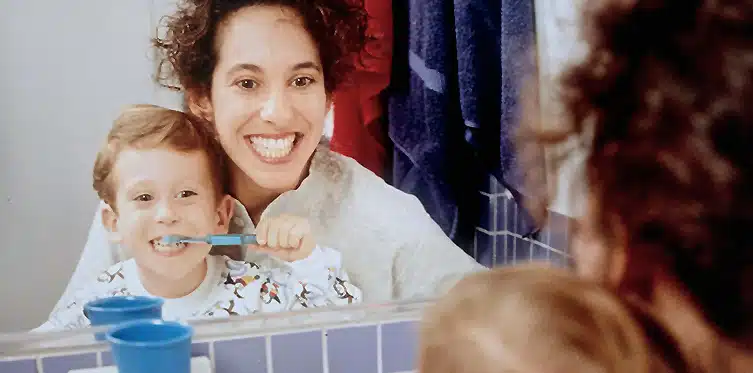 Mom and Child Brushing Teeth
